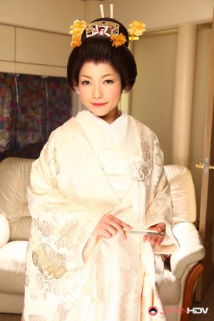Japanese woman Yui Ayana has her breasts fondled under traditional clothing