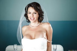 Brunette babe Veronica Avluv freeing big MILF tits from wedding dress