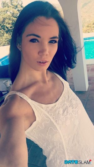 Amateur model Lovenia Lux takes clothed and topless selfies