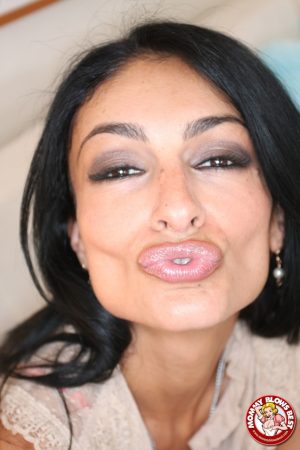 Busty Iranian chick Persia Pele fixes her lips before sucking cock