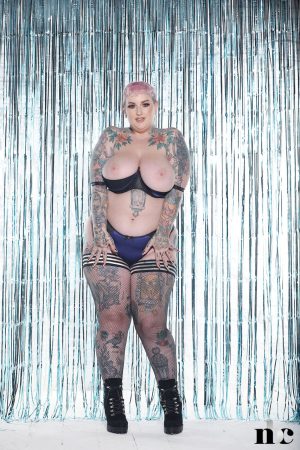 Pink haired BBW Cherrie Pie strips & exposes her monster tits and inked booty