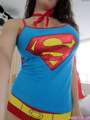 Amateur Katie Banks frees fakes tits from Superman outfit while taking selfies