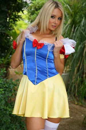 Hot MILF with big tits Stevie strips her fairy tale costume & poses outdoors