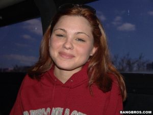 Adorable redhead amateur Ashley flashes natural tit & hot teen ass in the car