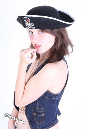 Young amateur unveils her little boobs while wearing a pirate hat
