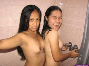 Asian teens get caught having lesbian sex while in the shower