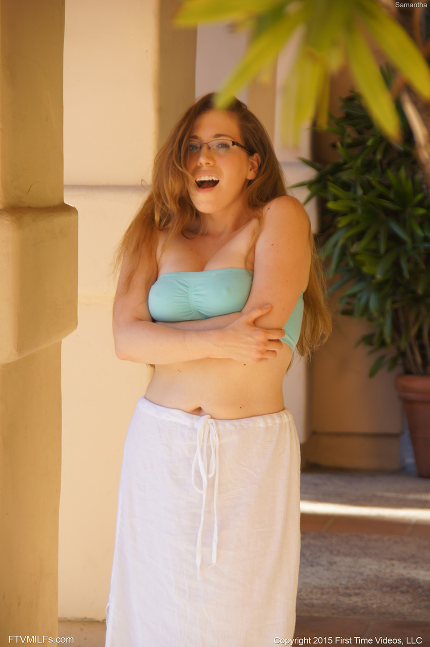 Curvy MILF with eyeglasses Samantha squeezing her big boobs outdoors