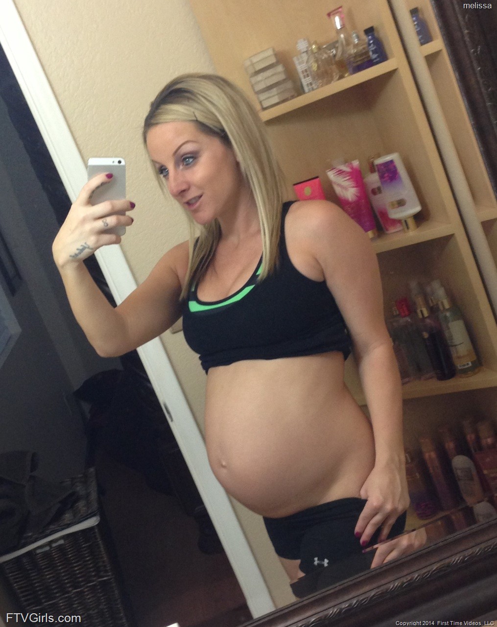 Big boobed pregnant blonde Stacy Cruz taking selfies in the mirror